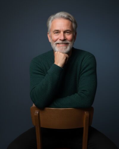 Older man thinking with an open face and smiling