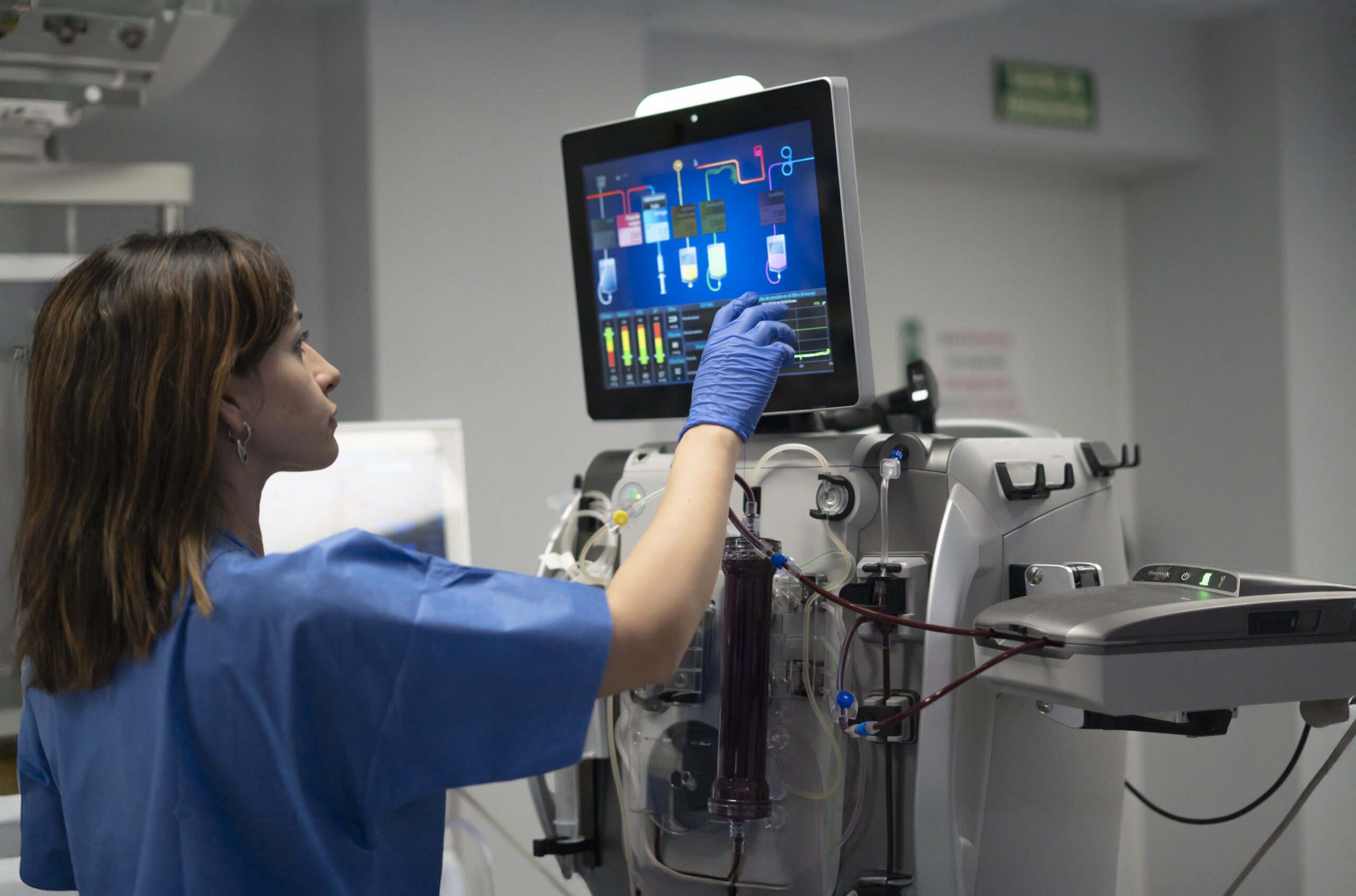 Medical Professional Operating Advanced Dialysis Machine