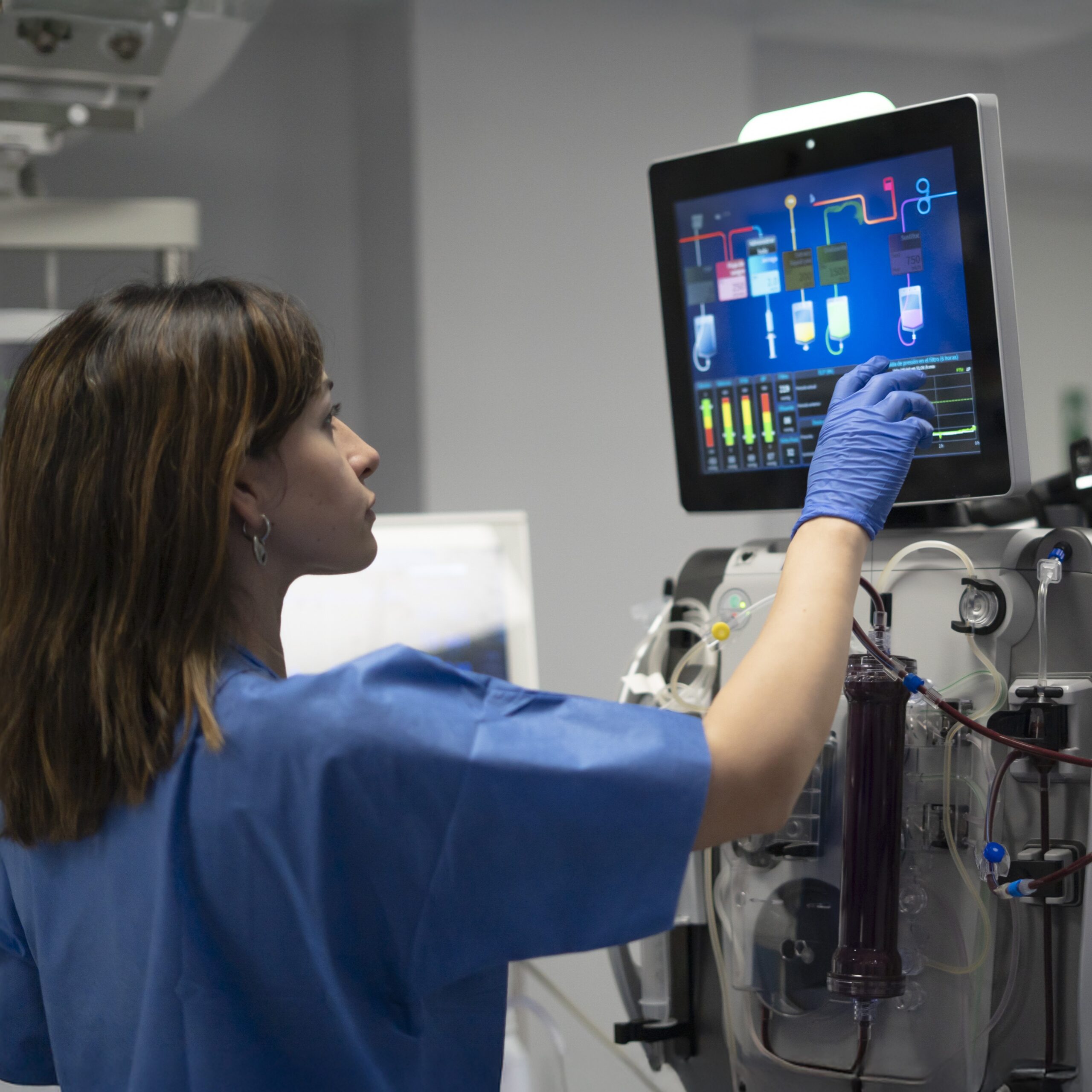 Medical Professional Operating Advanced Dialysis Machine